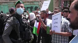 Stun grenades used as Israeli forces detain Palestine protesters angry at construction near ancient tomb