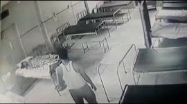 Shocking CCTV footage shows a staffer try to look private part of a woman patient in a Hospital