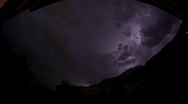 SPOOKY 4K TIMELAPSE INCOMING STORM AT NIGHT WITH LIGHTNING IN SWITZERLAND FISHEYE LENS VIEW GHOSTLY