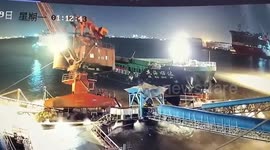 Crane falls into river after cargo ship collides with wharf in eastern China