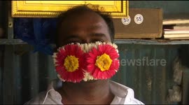 Indian florist produces vibrant face masks for bridesmaids attending weddings