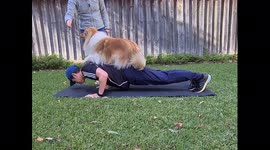 This dog is more than happy to take part in her owner's workout routines