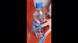 Russian woman with extremely long nails demonstrates how she does everyday tasks