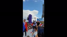 the Patrouille de France flies over the crowd of Tokyo 2020 French medalists and fans