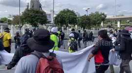 Protesters dump fruit on ground at rally in Bangkok, Thailand