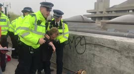 FILE: Police detain Extinction Rebellion protesters on Waterloo Bridge in April 2019