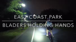 Cute Couple roller blading and holdings hands on a date Enjoying the breeZe