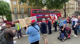 Anti-vaccine protesters meet Gurkha protesters in London's Whitehall