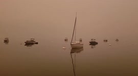 White Rock Lake Fire darkens skies above Vernon in BC, Canada