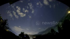 4K timelapse fisheye lens clouds moving nightsky milky way Switzerland