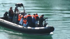 UK Navy boat brings migrants into Dover after English Channel rescue by French Navy