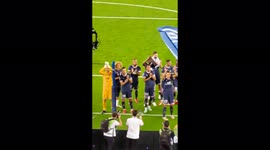 PSG players celebrate with their fans