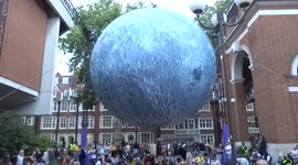 Visitors admire spectacular Museum of Moon installation in Kensington Town Square in London