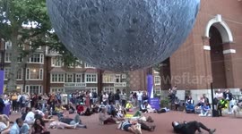 Moongazers admire Museum of Moon installation in Kensington Town Square in London