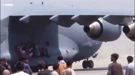 Stowaways cling to U.S. Air Force plane moments before falling to their death in Afghanistan