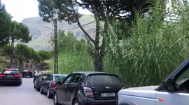 Lebanese queue in Ehden for gas amid economic crisis