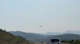 Incredible piloting skills on display out at Parleys Canyon, US to help put out the fire