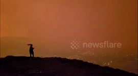 Dangerous Canadian wildfires turn sky orange