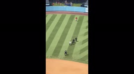 'BRAVE Ball Girl Helps Security Catch Field Runner at Dodger Baseball Stadium'