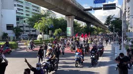 Thai agitators march through Bangkok before violent police clashes