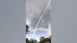 Incredible waterspout tornado forms over homes in Thailand
