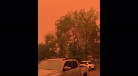 US: California Wildfire Turns Nevada Sky Orange 2