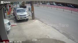 The cement truck nearly ran over a man on a scooter