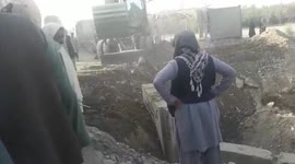 Afghan workers begin rebuilding damaged road in Kandahar