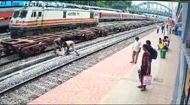 Elderly man has a lucky escape when he tries to cross a train track in South India