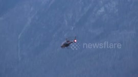 Helicopters and Emergency Crews Fighting Wildfires in British Columbia, Canada