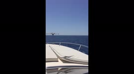 Close call as seaplane attempting to land nearly hits speedboat in Australia