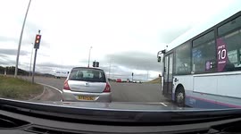 Mercedes driver cuts me off at a cross junction almost causing a crash.
