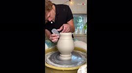 Super-satisfying footage shows potter making beautiful vase and then destroying it