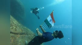 Scuba driver in South India hoists Indian flag  at 60 feet deep in Ocean waters