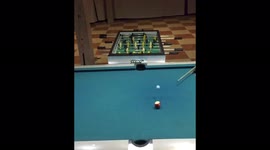 Persian pool shark's INCREDIBLE combination table-football and pool-table trick shot