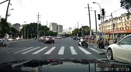 Driverless motorcycle speeds through busy road after being rear-ended by car in eastern China