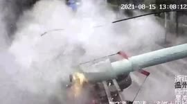 Truck with crane knocks over steam pipeline in eastern China