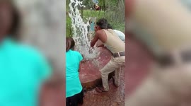 Fountain of water spurts from nonfunctional hand pump in central India