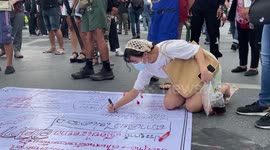 Thai anti-government activists vandalise road Bangkok