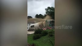 Moment tanker lorry sprays 13,000 litres of thick brown liquid all over UK road