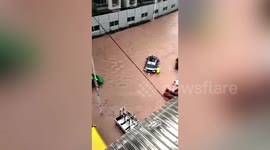 Flash floods cause landslide and submerge Chinese city