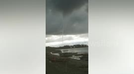 Philippines: impressive tornadic waterspout swirls up out of the sea frightening residents