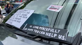 Thai agitators anarchists vandalise police car at rally in Bangkok