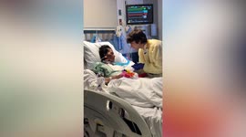 Emotional moment boyfriend proposes to her girlfriend as she wakes up from coma