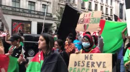 Protesters march along Regent Street in London chanting “ban ban Taliban”