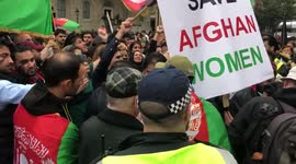 Protesters outside Downing Street chant “Save Afghan Women” during a protest in London