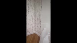 A compilation of start to finish of a classy office space papered by a female decorator