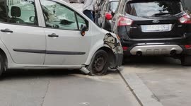 A driver abandoned his car in the street after a crash , causing a road obstruction. Paris, rue Baudricourt. 22aug2021.08h30am
