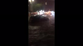 Hurricane Henri causes street flooding in Brooklyn, New York