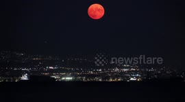 Stunning 'Sturgeon Moon' rises over Greece's second city Thessaloniki